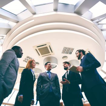 Business people communicating in board room